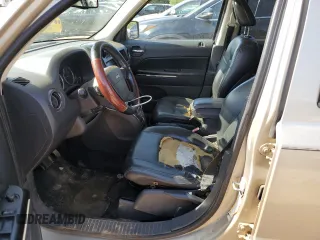 2009 Jeep Patriot Limited with VIN 1J4FT48B99D146489, listed as a Copart auction lot 52484925 with 251,986 mi miles and Salvage title. Bid and sale history available at DreamBid. Image 7.