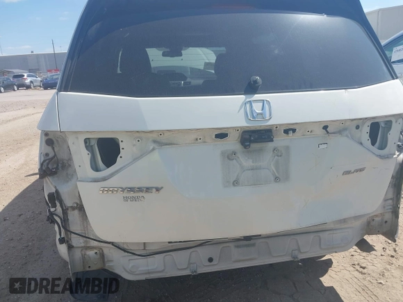 2016 Honda Odyssey Touring Elite with VIN 5FNRL5H98GB102544, listed as a IAAI auction lot 42040050 with 128,957 mi miles and . Bid and sale history available at DreamBid. Image 6.