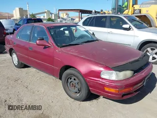 1992 Toyota Camry LE z VIN JT2SK12E5N0024814, wystawiony jako IAAI lot #42386859 z przebiegiem 235 476 mil mil oraz . Historia ofert i sprzedaży dostępna na DreamBid. Obrazek 1.