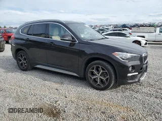 2019 BMW X1 xDrive28i with VIN WBXHT3C53K5N27090, listed as a Copart auction lot 54150485 with 79,835 mi miles and Salvage title. Bid and sale history available at DreamBid. Image 4.