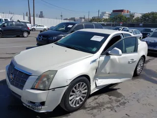 2010 Cadillac CTS with VIN 1G6DA5EG7A0135451, listed as a IAAI auction lot 41964313 with 136,172 mi miles and . Bid and sale history available at DreamBid. Image 2.