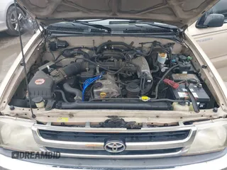 1999 Toyota Tacoma with VIN 4TAVL52N4XZ524059, listed as a IAAI auction lot 41761806 with 214,425 mi miles and . Bid and sale history available at DreamBid. Image 10.