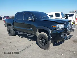 2019 Toyota Tacoma SR with VIN 5TFCZ5AN2KX167674, listed as a IAAI auction lot 41769094 with 112,904 mi miles and . Bid and sale history available at DreamBid. Image 1.