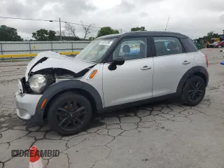 2012 MINI Countryman with VIN WMWZB3C5XCWM06778, listed as a Copart auction lot 61201285 with 64,676 mi miles and Salvage title. Bid and sale history available at DreamBid. Image 1.