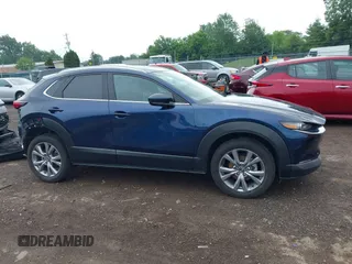 2022 Mazda CX-30 S Premium with VIN 3MVDMBDL0NM413545, listed as a IAAI auction lot 42493594 with 57,013 mi miles and . Bid and sale history available at DreamBid. Image 14.
