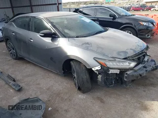 2020 Nissan Maxima SV z VIN 1N4AA6CV3LC371884, wystawiony jako IAAI lot #41823571 z przebiegiem 83 441 mil mil oraz . Historia ofert i sprzedaży dostępna na DreamBid. Obrazek 1.