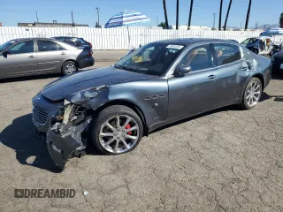 2006 Maserati Quattroporte z VIN ZAMCE39A960023356, wystawiony jako Copart lot #76954384 z przebiegiem 76 185 mil mil oraz Szkody całkowita. Historia ofert i sprzedaży dostępna na DreamBid. Obrazek 1.