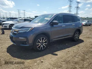 2019 Honda Pilot Touring 7-Passenger with VIN 5FNYF6H61KB014345, listed as a Copart auction lot 62479535 with 72,401 mi miles and Salvage title. Bid and sale history available at DreamBid. Image 1.