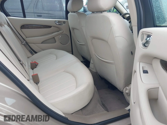 2003 Jaguar X-Type 2.5L Manual z VIN SAJEA51D53XC94089, wystawiony jako IAAI lot #42370566 z przebiegiem 81 687 mil mil oraz . Historia ofert i sprzedaży dostępna na DreamBid. Obrazek 8.
