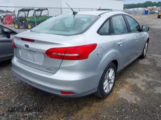 2015 Ford Focus SE with VIN 1FADP3F24FL238308, listed as a IAAI auction lot 42707422 with 134,585 mi miles and . Bid and sale history available at DreamBid. Image 4.