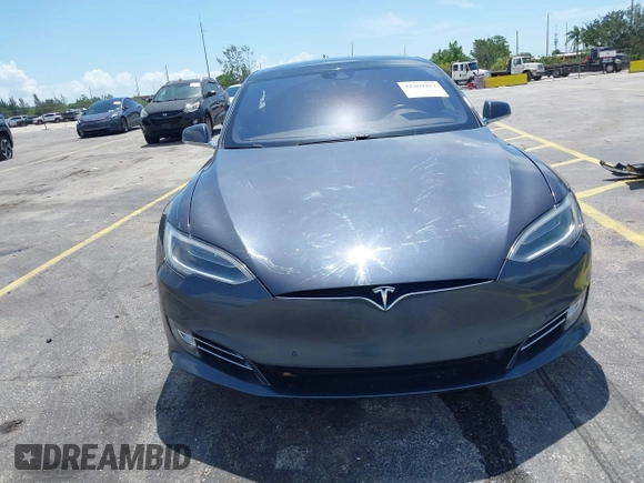 2016 Tesla Model S 70 with VIN 5YJSA1E16GF156312, listed as a IAAI auction lot 42469451 with 90,317 mi miles and . Bid and sale history available at DreamBid. Image 13.
