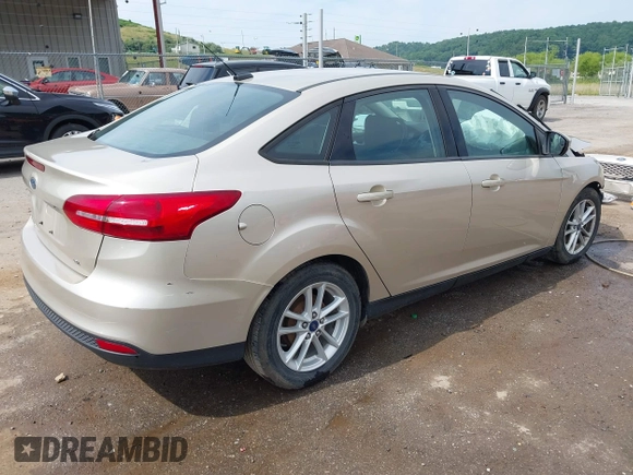 2017 Ford Focus SE with VIN 1FADP3F20HL237823, listed as a IAAI auction lot 39690628 with 104,747 mi miles and . Bid and sale history available at DreamBid. Image 4.
