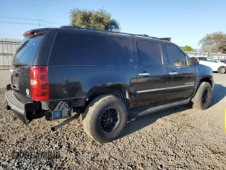 2010 Chevrolet Suburban LTZ with VIN 1GNUCKE09AR251410, listed as a Copart auction lot 73202774 with 247,631 mi miles and Salvage Title. Bid and sale history available at carsss.com. Image 3.