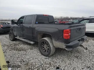 2014 Chevrolet Silverado 1500 High Country with VIN 3GCUKTEC0EG471780, listed as a Copart auction lot 38906224 with 143,591 mi miles and Salvage Title. Bid and sale history available at carsss.com. Image 2.