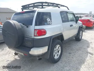2007 Toyota FJ Cruiser with VIN JTEBU11F270030712, listed as a IAAI auction lot 42076564 with 265,000 mi miles. Bid and sale history available at carsss.com. Image 4.