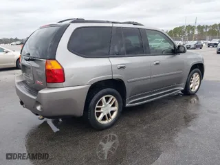 2006 GMC Envoy Denali with VIN 1GKET63M262240313, listed as a IAAI auction lot 41605984 with 199,896 mi miles. Bid and sale history available at carsss.com. Image 4.