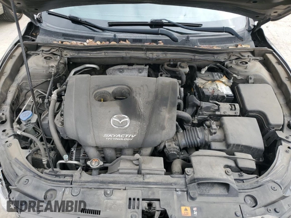 2014 Mazda 3 S Touring with VIN JM1BM1V31E1105847, listed as a Copart auction lot 50045925 with 121,538 mi miles and Salvage Title. Bid and sale history available at DreamBid. Image 12.