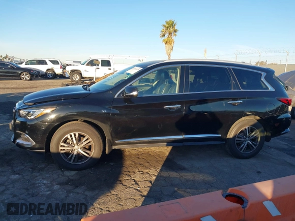 2020 Infiniti QX60 Pure with VIN 5N1DL0MNXLC505914, listed as a IAAI auction lot 41336979 with 53,813 mi miles and . Bid and sale history available at DreamBid. Image 14.