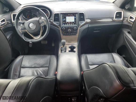 2017 Jeep Grand Cherokee Overland with VIN 1C4RJECG2HC903366, listed as a Copart auction lot 44140155 with 102,459 mi miles and Salvage Title. Bid and sale history available at carsss.com. Image 8.