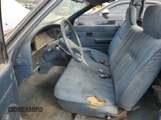 1990 Toyota Pickup DX с VIN JT4RN81P1L5069533, выставлен на аукционе Copart как лот 78433024 с пробегом 277 999 миль миль и Списание • Salvage title. История ставок и продаж доступна на DreamBid. Изображение 7.