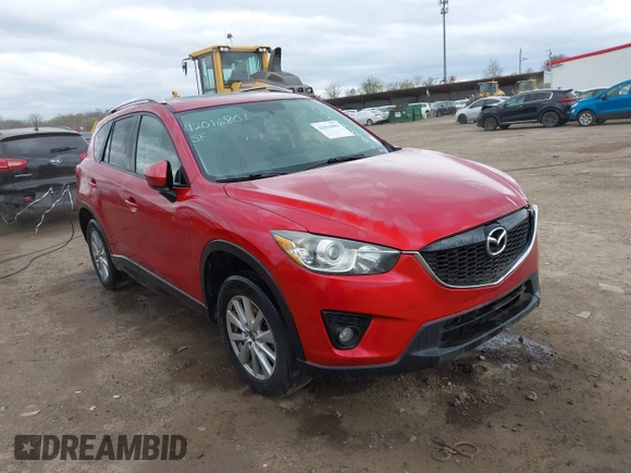 2014 Mazda CX-5 Touring z VIN JM3KE2CY3E0424892, wystawiony jako IAAI lot #42016801 z przebiegiem 173 350 mil mil oraz . Historia ofert i sprzedaży dostępna na DreamBid. Obrazek 1.