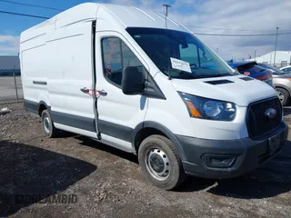 2023 Ford Transit Cargo with VIN 1FTBR3X86PKA69978, listed as a IAAI auction lot 41815672 with 60,590 mi miles and . Bid and sale history available at DreamBid. Image 1.