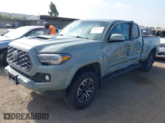 2022 Toyota Tacoma SR5 z VIN 3TMBZ5DN3NM034388, wystawiony jako IAAI lot #42270543 z przebiegiem 179 904 mil mil oraz . Historia ofert i sprzedaży dostępna na DreamBid. Obrazek 17.