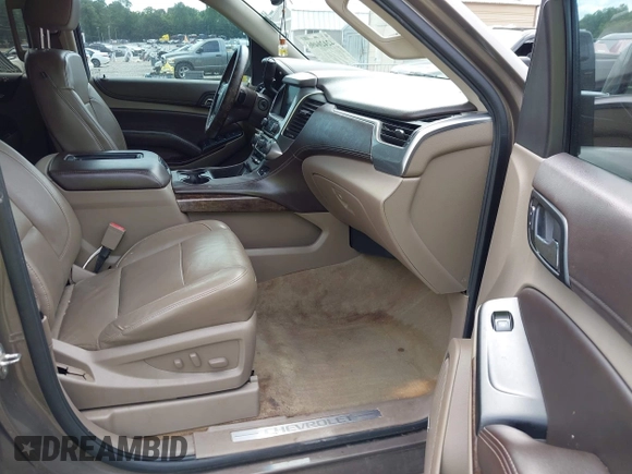 2015 Chevrolet Tahoe LT with VIN 1GNSCBKC5FR585138, listed as a IAAI auction lot 42420496 with 177,104 mi miles and . Bid and sale history available at DreamBid. Image 5.