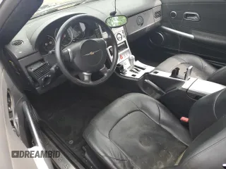 2004 Chrysler Crossfire z VIN 1C3AN69L54X014337, wystawiony jako Copart lot #64790664 z przebiegiem 121 344 mil mil oraz Czysty tytuł • Clean title. Historia ofert i sprzedaży dostępna na DreamBid. Obrazek 8.