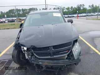 2017 Dodge Journey SE z VIN 3C4PDCABXHT683196, wystawiony jako IAAI lot #42340532 z przebiegiem 170 173 mil mil oraz . Historia ofert i sprzedaży dostępna na DreamBid. Obrazek 13.
