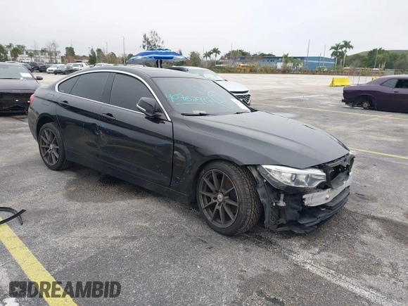 2016 BMW 4 Series 428i xDrive with VIN WBA4C9C58GG136248, listed as a IAAI auction lot 41346270 with 129,464 mi miles and . Bid and sale history available at carsss.com. Image 1.