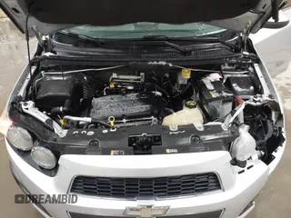 2014 Chevrolet Sonic LT with VIN 1G1JC5SG8E4107664, listed as a IAAI auction lot 41614306 with 128,946 mi miles and . Bid and sale history available at DreamBid. Image 10.