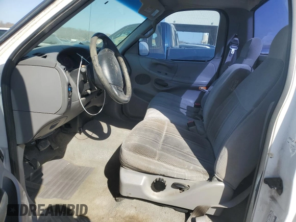 1997 Ford F-150 с VIN 1FTDF18W8VKC62309, выставлен на аукционе Copart как лот 48137745 с пробегом 156 917 миль миль и Списание • Salvage title. История ставок и продаж доступна на DreamBid. Изображение 7.