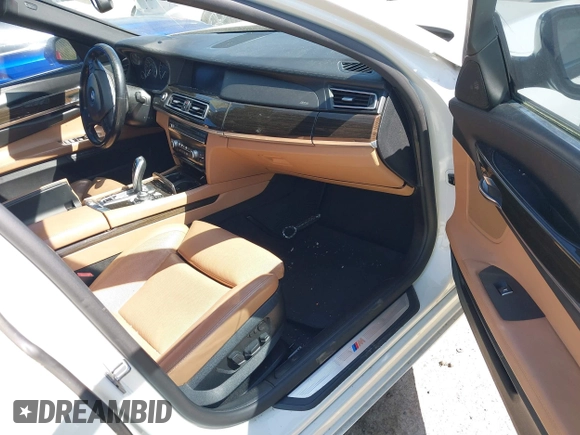2012 BMW 7 Series 750Li with VIN WBAKB8C52CDX20757, listed as a IAAI auction lot 42057654 with 137,947 mi miles. Bid and sale history available at carsss.com. Image 5.