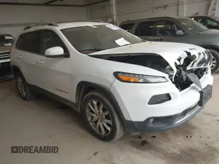 2015 Jeep Cherokee Limited with VIN 1C4PJMDB1FW771782, listed as a IAAI auction lot 41863617 with 241,786 mi miles. Bid and sale history available at carsss.com. Image 1.