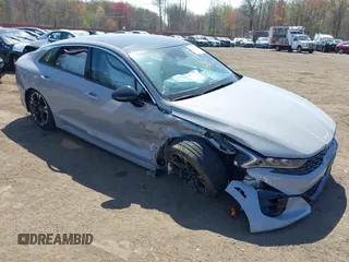 2022 Kia K5 GT-Line z VIN 5XXG64J26NG109802, wystawiony jako IAAI lot #42084213 z przebiegiem 33 180 mil mil oraz . Historia ofert i sprzedaży dostępna na DreamBid. Obrazek 1.