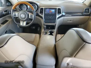 2013 Jeep Grand Cherokee Overland with VIN 1C4RJECT7DC526119, listed as a Copart auction lot 60735594 with 143,454 mi miles and Clean Title. Bid and sale history available at carsss.com. Image 8.