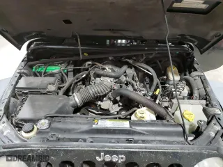 2010 Jeep Wrangler Unlimited Rubicon with VIN 1J4BA6H12AL177942, listed as a Copart auction lot 80460894 with 63,668 mi miles and Salvage Title. Bid and sale history available at carsss.com. Image 12.