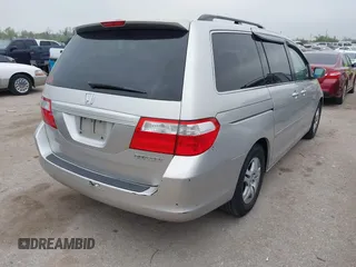 2005 Honda Odyssey EX-L with VIN 5FNRL38625B421123, listed as a IAAI auction lot 41886027 with 174,459 mi miles. Bid and sale history available at carsss.com. Image 4.