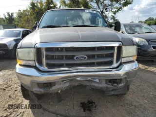 2003 Ford Super Duty F-250 XL with VIN 1FTNW21L33EC50476, listed as a Copart auction lot 67627394 with 277,849 mi miles and Salvage Title. Bid and sale history available at carsss.com. Image 5.