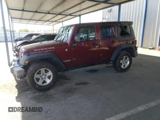 2010 Jeep Wrangler Unlimited Rubicon with VIN 1J4BA6H18AL197855, listed as a Copart auction lot 57748185 with 147,899 mi miles and Salvage title. Bid and sale history available at DreamBid. Image 1.