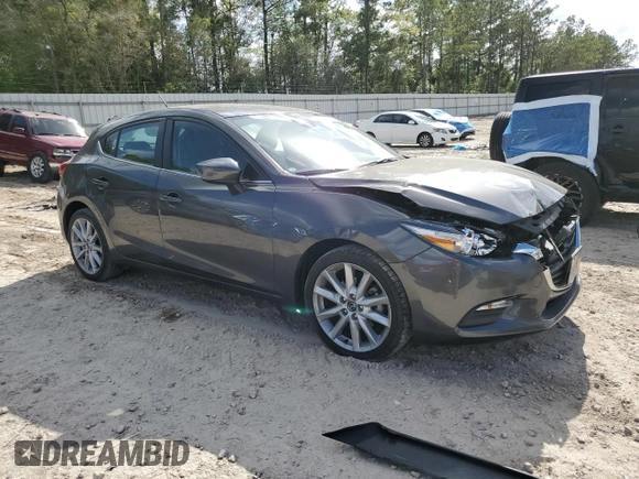 2017 Mazda 3 Touring with VIN 3MZBN1L77HM117864, listed as a Copart auction lot 51895385 with 63,076 mi miles and Salvage Title. Bid and sale history available at carsss.com. Image 4.