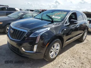 2022 Cadillac XT5 FWD Luxury z VIN 1GYKNAR4XNZ165234, wystawiony jako Copart lot #75041424 z przebiegiem 36 100 mil mil oraz Nie do naprawy • Non repairable. Historia ofert i sprzedaży dostępna na DreamBid. Obrazek 1.