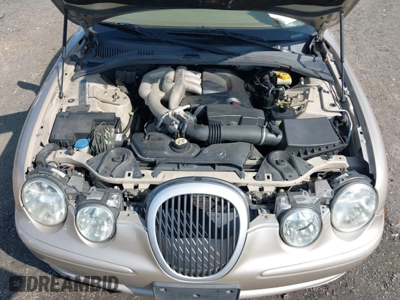 2005 Jaguar S-Type with VIN SAJWA01T95FN22745, listed as a IAAI auction lot 41898269 with 57,614 mi miles and . Bid and sale history available at DreamBid. Image 10.
