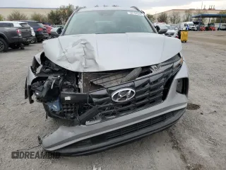 2022 Hyundai Tucson SEL z VIN 5NMJFCAE5NH147033, wystawiony jako Copart lot #50194695 z przebiegiem 30 178 mil mil oraz Szkoda całkowita • Salvage title. Historia ofert i sprzedaży dostępna na DreamBid. Obrazek 5.