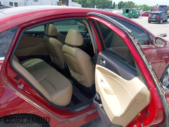 2012 Hyundai Sonata Hybrid z VIN KMHEC4A4XCA031014, wystawiony jako IAAI lot #42463501 z przebiegiem 113 309 mil mil oraz . Historia ofert i sprzedaży dostępna na DreamBid. Obrazek 8.