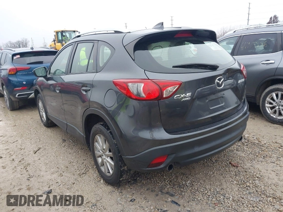 2016 Mazda CX-5 Sport with VIN JM3KE4BY5G0885754, listed as a IAAI auction lot 41103575 with 136,263 mi miles and . Bid and sale history available at carsss.com. Image 3.