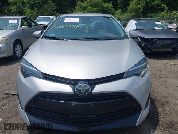 2018 Toyota Corolla L with VIN 2T1BURHE8JC116054, listed as a IAAI auction lot 42450016 with 65,342 mi miles and . Bid and sale history available at DreamBid. Image 12.