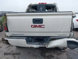 2014 GMC Sierra 1500 Denali z VIN 3GTU2WEJ5EG492544, wystawiony jako IAAI lot #41644535 z przebiegiem 215 469 mil mil oraz . Historia ofert i sprzedaży dostępna na DreamBid. Obrazek 16.