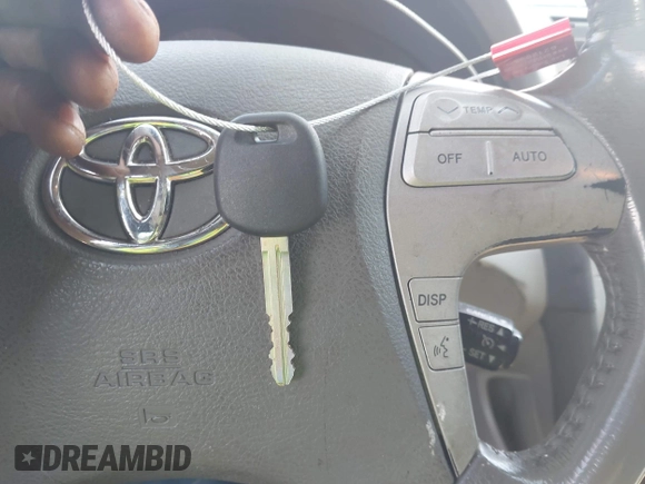 2007 Toyota Camry CE with VIN JTNBE46K173065969, listed as a IAAI auction lot 42036785 with 259,386 mi miles and . Bid and sale history available at DreamBid. Image 11.